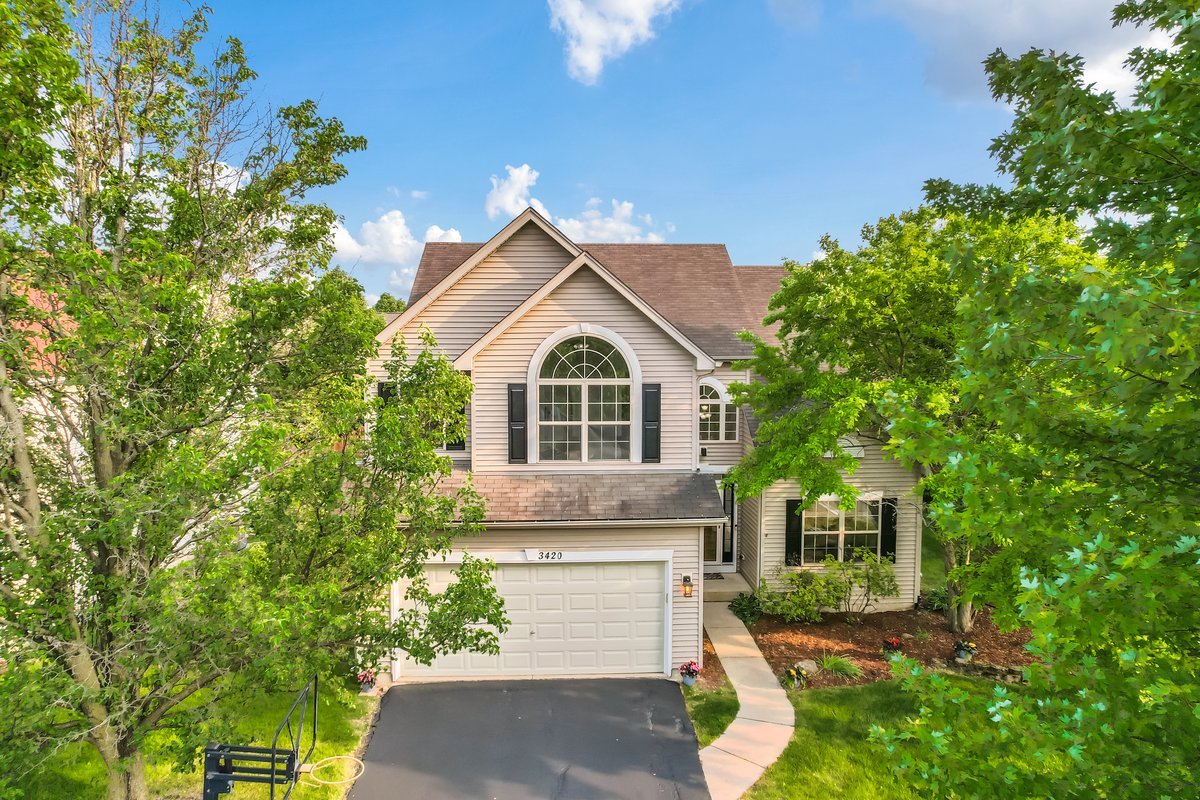 3420 Parliament Lane Naperville, IL 60564 - Photo 1 of 47 a view of front of house with a yard