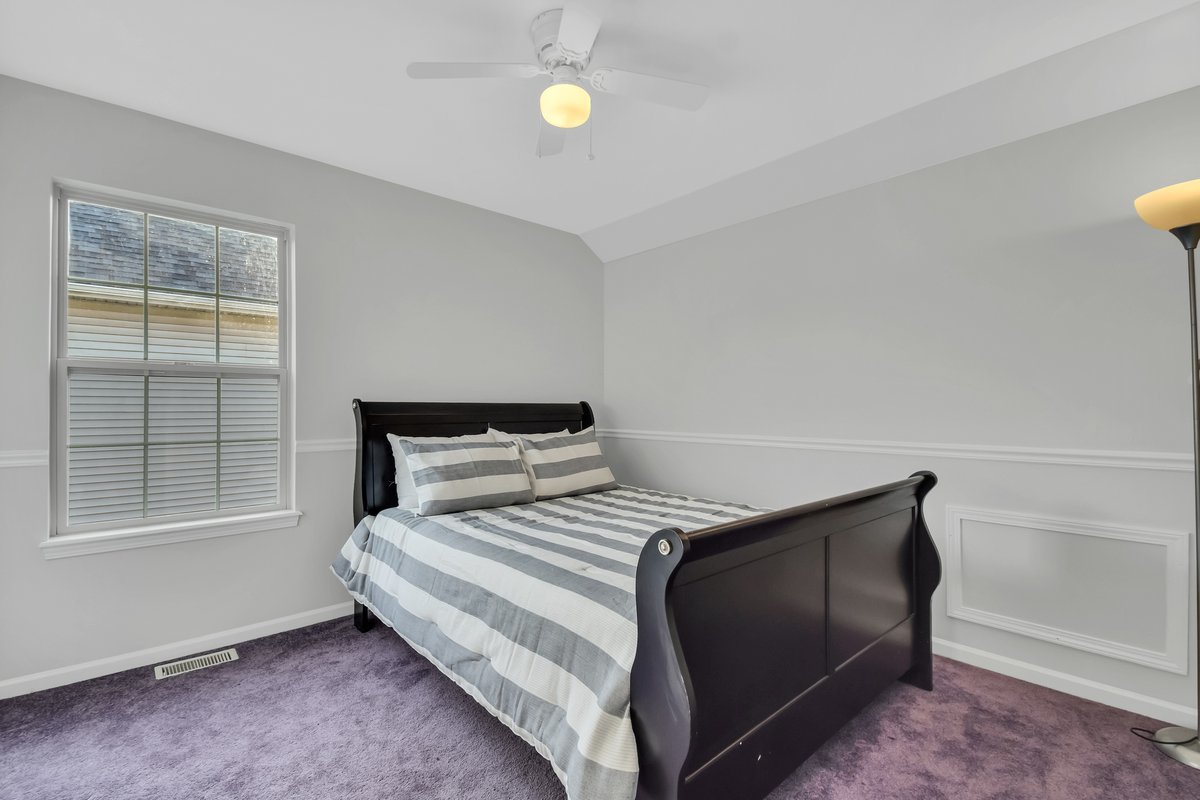 3420 Parliament Lane Naperville, IL 60564 - Photo 20 of 47 a bedroom with a bed and a window