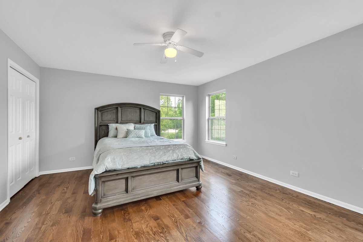 3420 Parliament Lane Naperville, IL 60564 - Photo 29 of 47 a bedroom with a bed and window