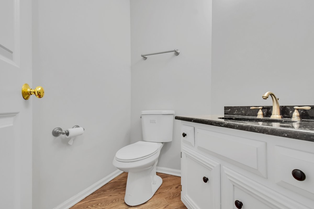 3420 Parliament Lane Naperville, IL 60564 - Photo 38 of 47 a bathroom with a sink and a toilet