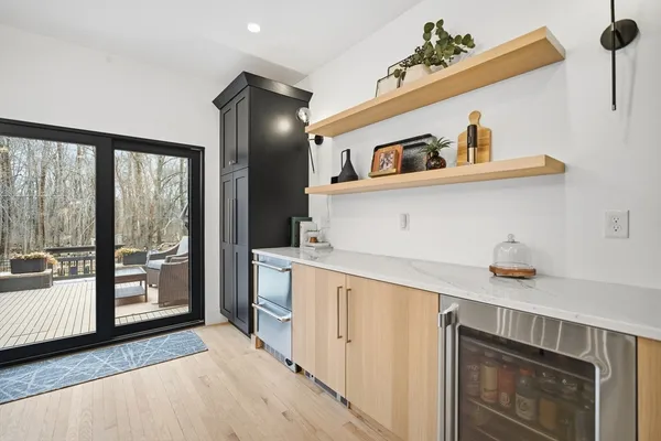 a kitchen with a stove and a refrigerator