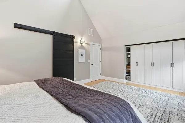 a bedroom with a large bed