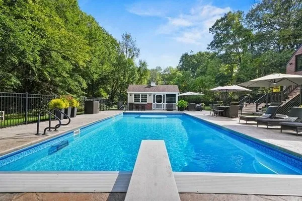 a view of a house with a swimming pool