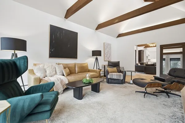 a living room with furniture and a couch