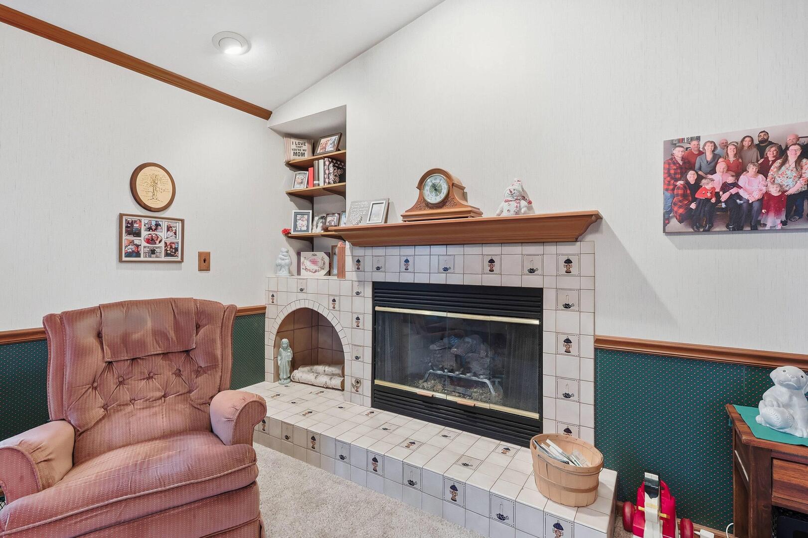 1806 41st Street Moline, IL 61265 - Photo 14 of 35 a living room with furniture and a fireplace