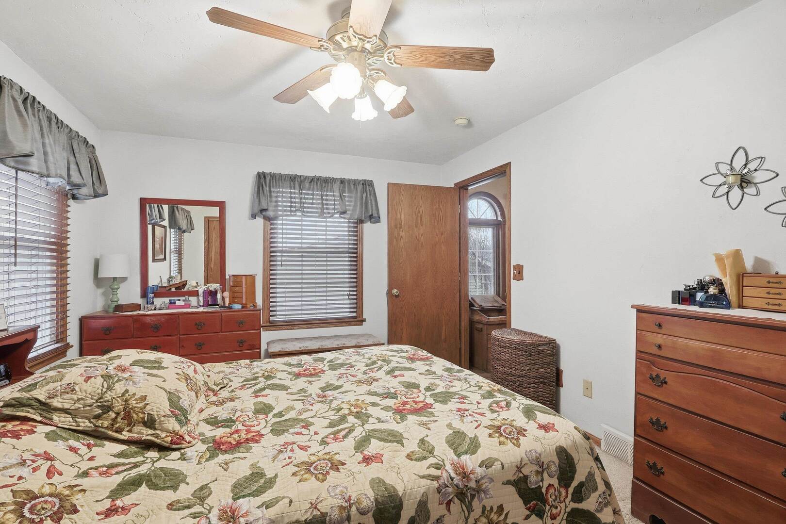 1806 41st Street Moline, IL 61265 - Photo 21 of 35 a bedroom with a large bed and dresser