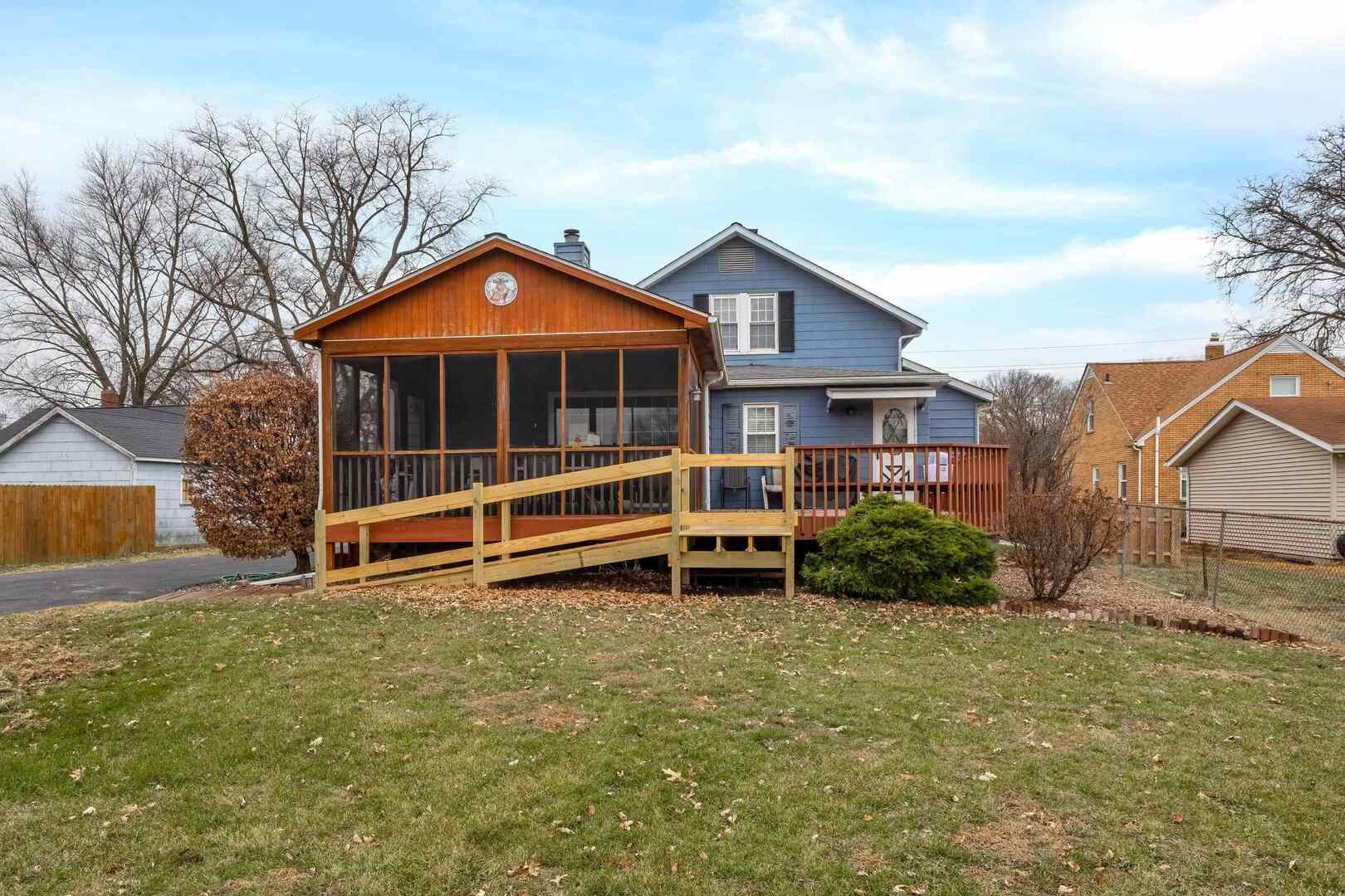 1806 41st Street Moline, IL 61265 - Photo 33 of 35 a view of backyard of house and wooden deck