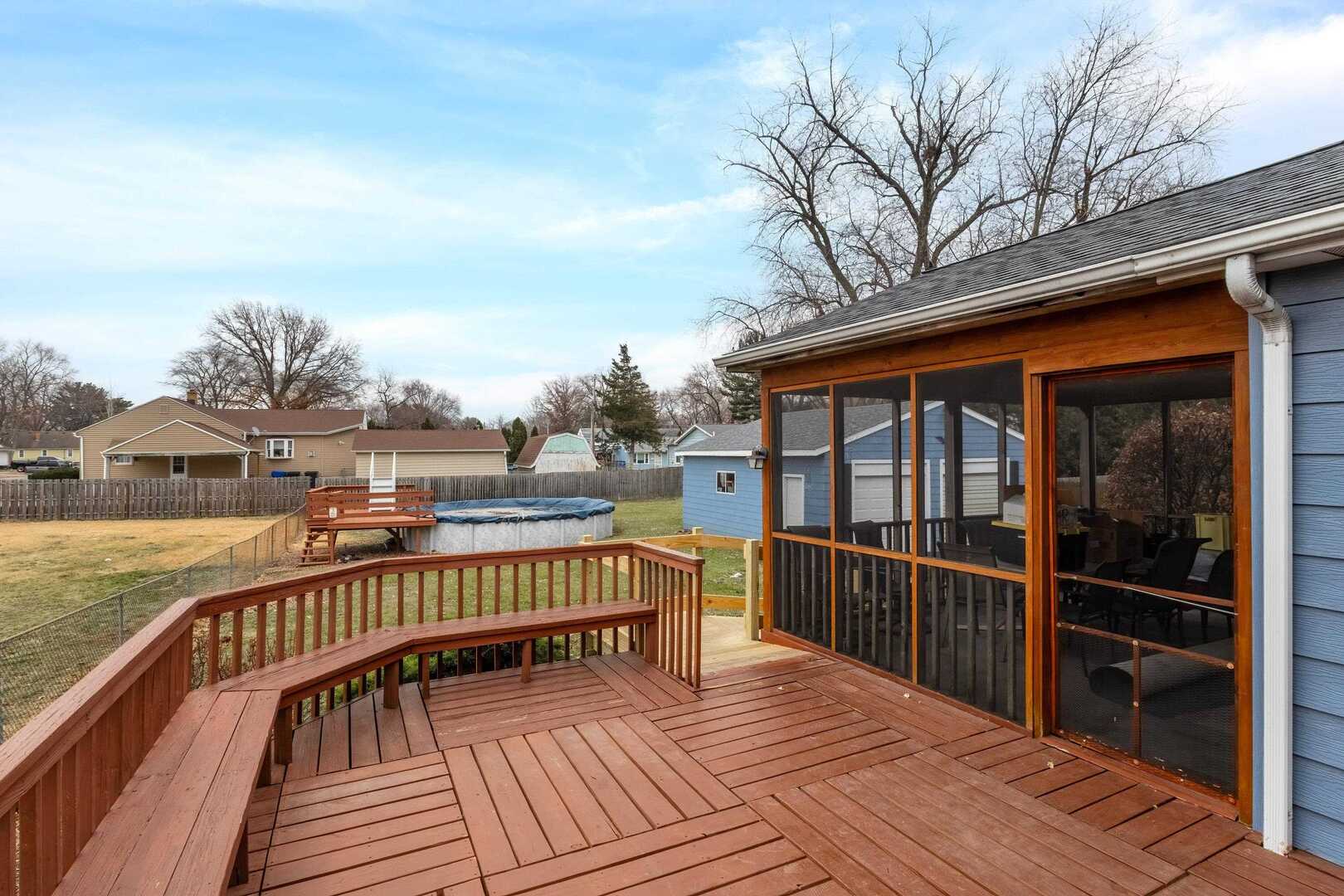 1806 41st Street Moline, IL 61265 - Photo 34 of 35 a view of balcony with wooden floor and fence