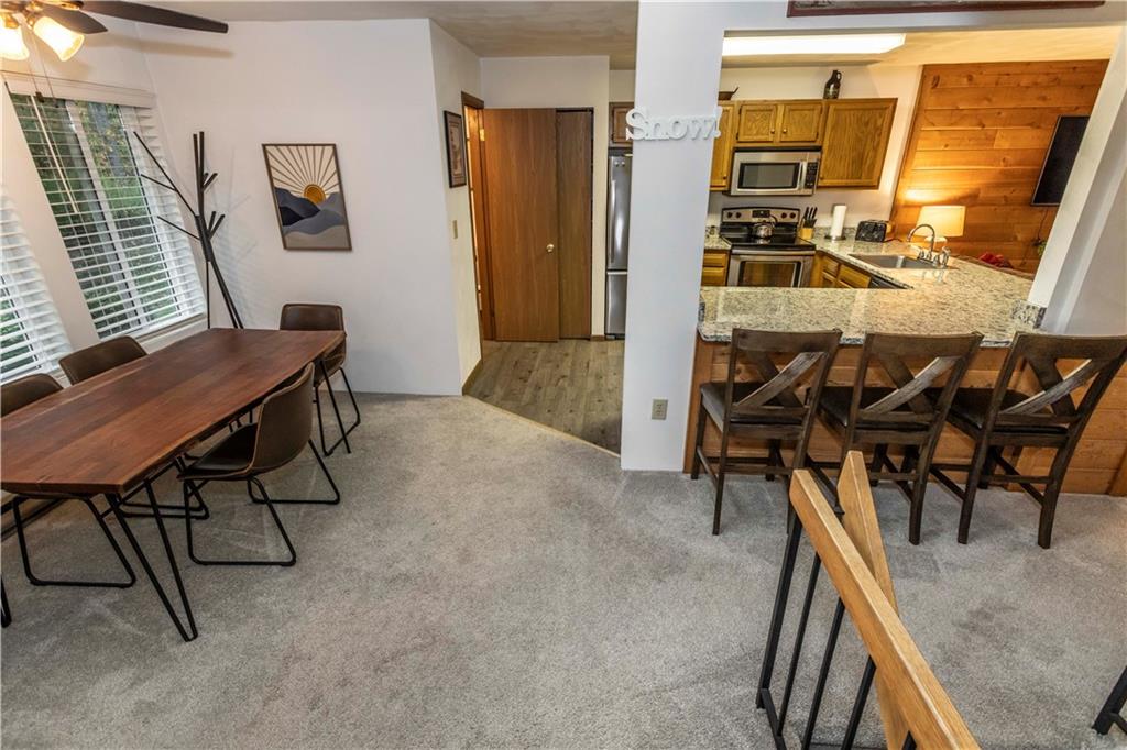 1821 Eagles Ridge Terrace Hidden Valley, PA 15502 - Photo 15 of 49 a view of a livingroom with furniture and window