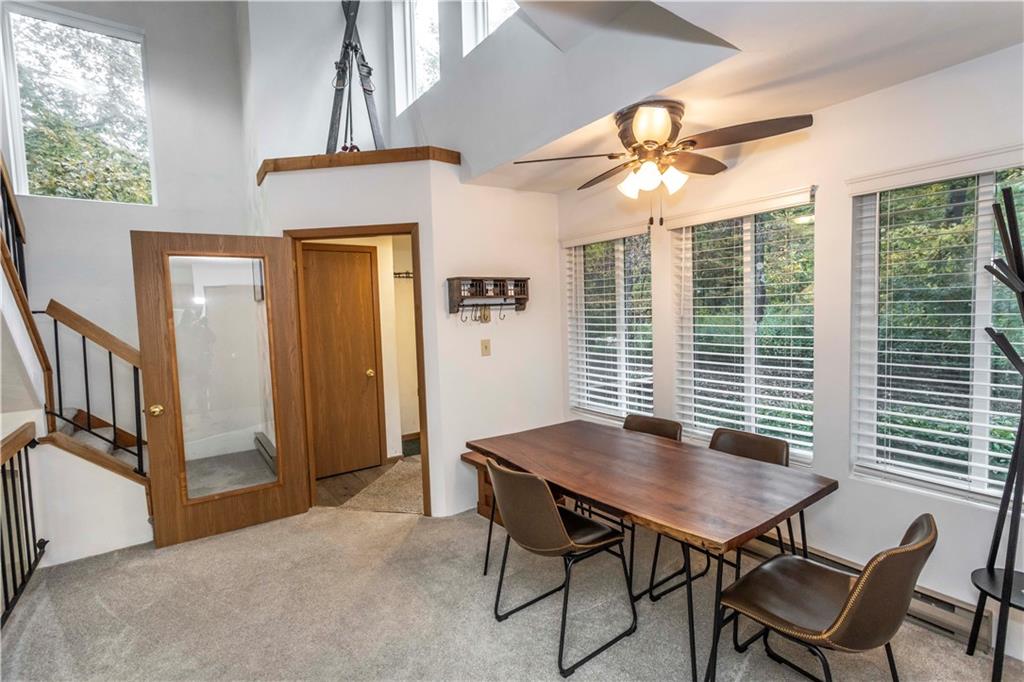 1821 Eagles Ridge Terrace Hidden Valley, PA 15502 - Photo 17 of 49 a view of a dining room with furniture and window