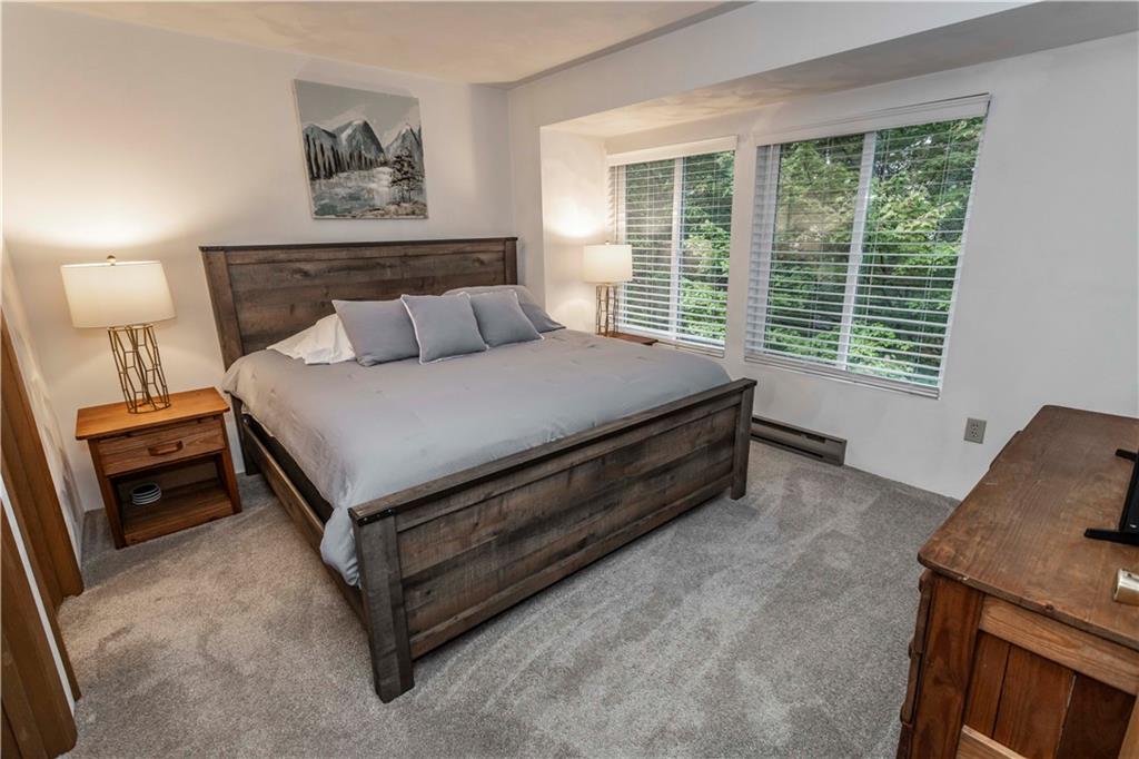 1821 Eagles Ridge Terrace Hidden Valley, PA 15502 - Photo 21 of 49 a bed sitting in a bedroom next to a window