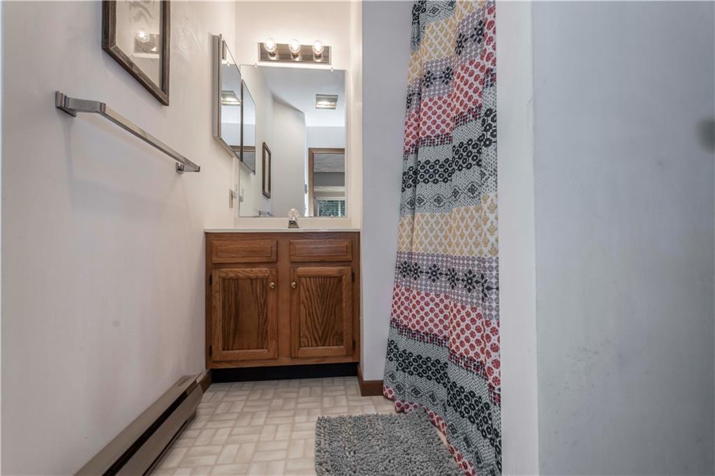 1821 Eagles Ridge Terrace Hidden Valley, PA 15502 - Photo 23 of 49 a bathroom with a sink and mirror