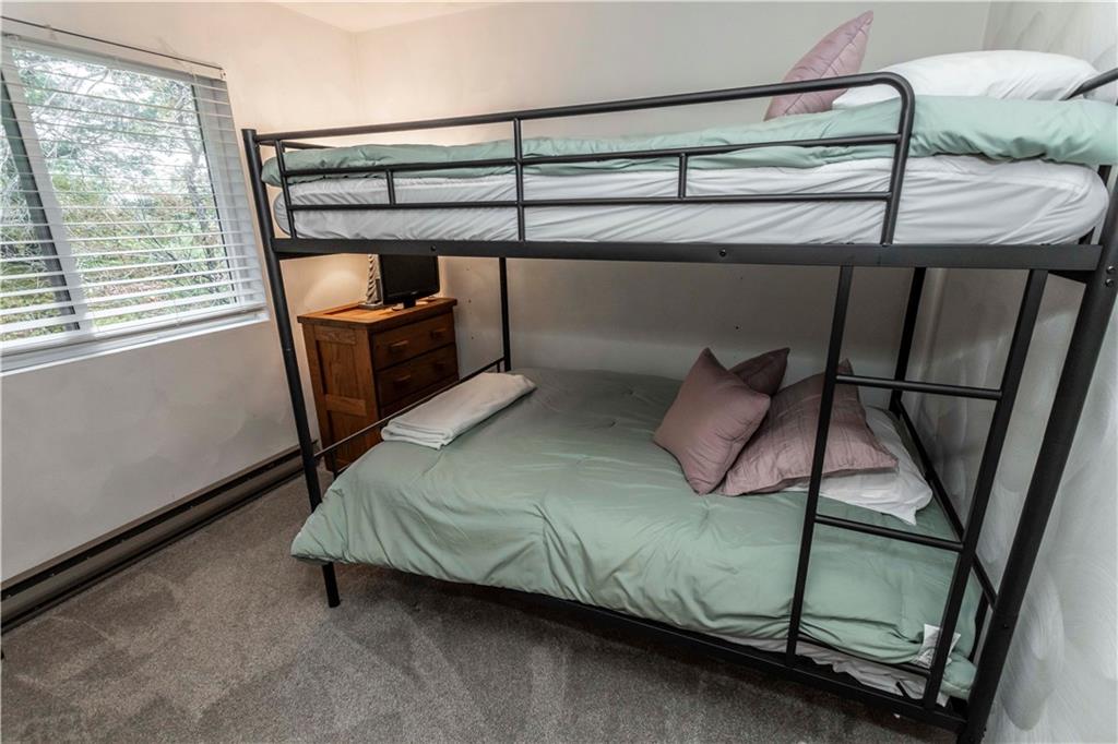 1821 Eagles Ridge Terrace Hidden Valley, PA 15502 - Photo 25 of 49 a bedroom with a bed and a window