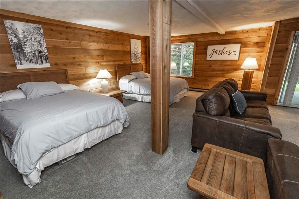 1821 Eagles Ridge Terrace Hidden Valley, PA 15502 - Photo 28 of 49 a bedroom with a bed and wooden floor