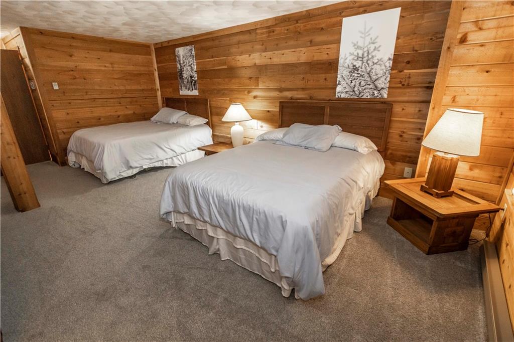 1821 Eagles Ridge Terrace Hidden Valley, PA 15502 - Photo 31 of 49 a bedroom with two beds and painted walls