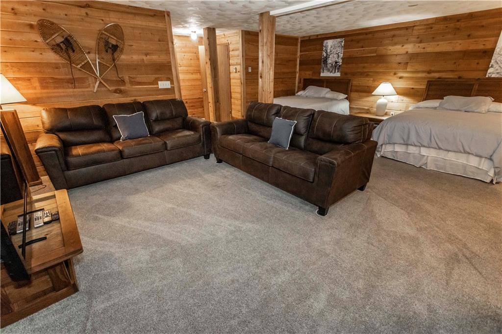 1821 Eagles Ridge Terrace Hidden Valley, PA 15502 - Photo 33 of 49 a living room with furniture and a window