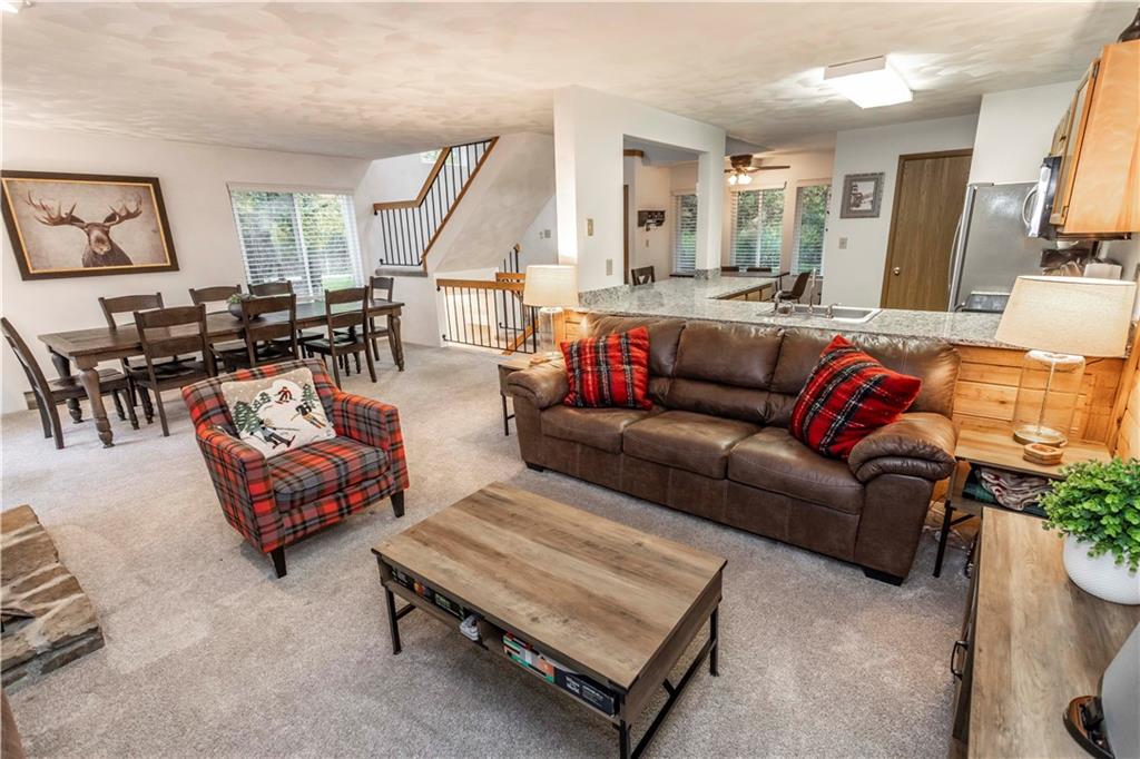 1821 Eagles Ridge Terrace Hidden Valley, PA 15502 - Photo 9 of 49 a living room with furniture and a large window