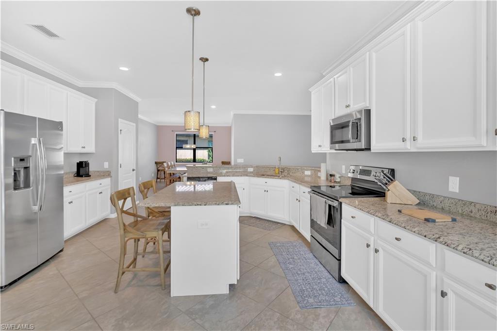 4246 Raffia Preserve Way Naples, FL 34119 - Photo 9 of 43