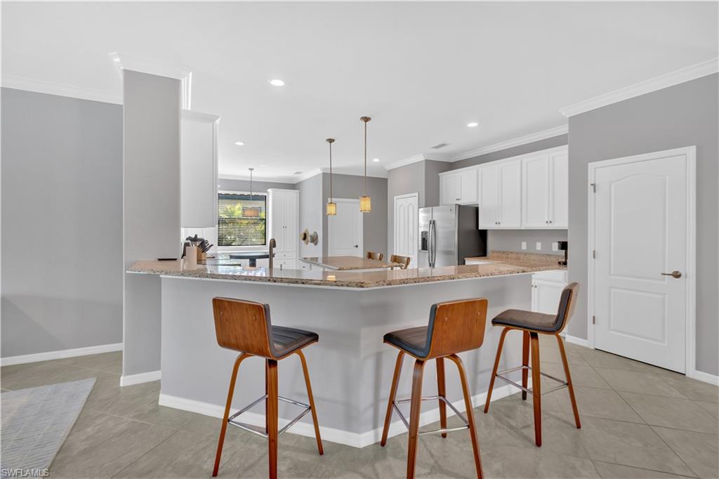 4246 Raffia Preserve Way Naples, FL 34119 - Photo 10 of 43