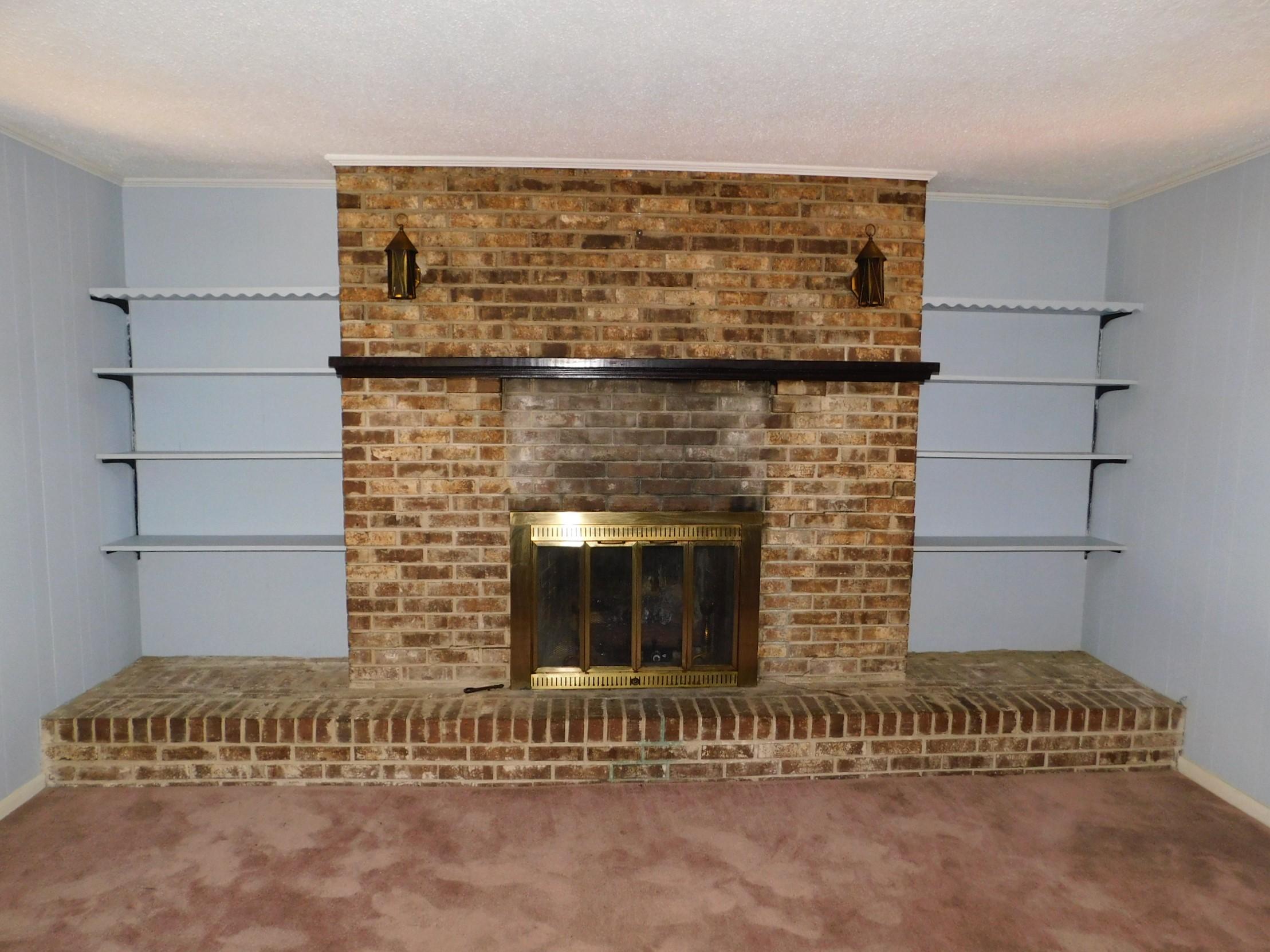 6001 Rembert Drive Hanahan, SC 29410 - Photo 11 of 19 Family room fireplace