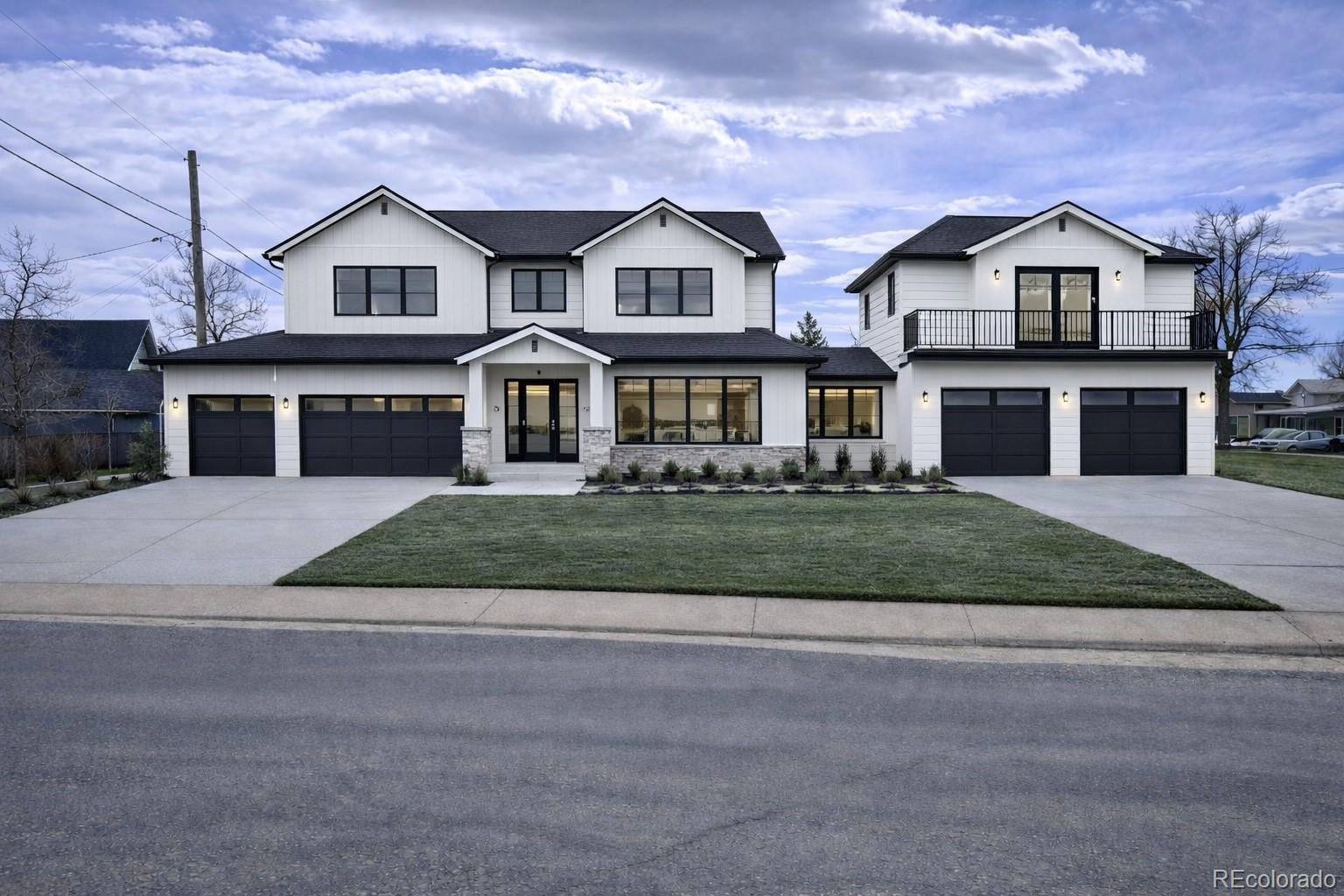 3292 Benton Street Wheat Ridge, CO 80212 - Photo 4 of 12 a front view of residential houses with yard