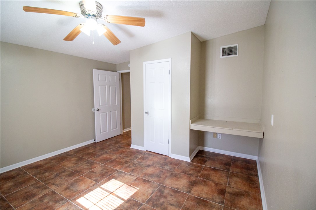 1804 North McKinley Street Beeville, TX 78102 - Photo 14 of 15 a view of room with a ceiling fan