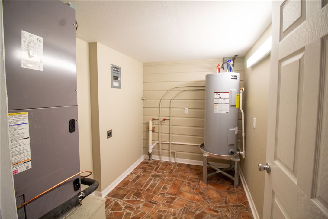 1804 North McKinley Street Beeville, TX 78102 - Photo 15 of 15 a room with walk in closet and wooden floor