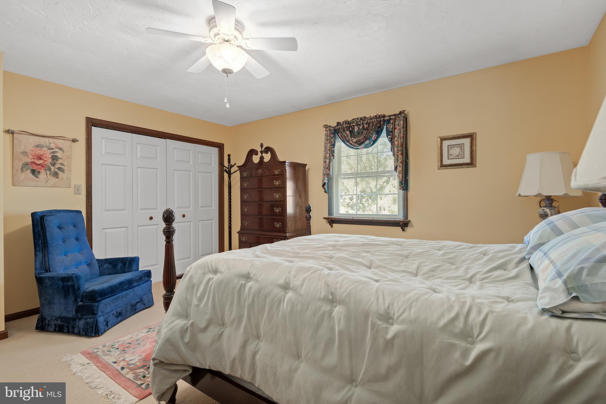17 Buttonwood Drive Lititz, PA 17543 - Photo 30 of 42 a bedroom with a bed and dresser with chair