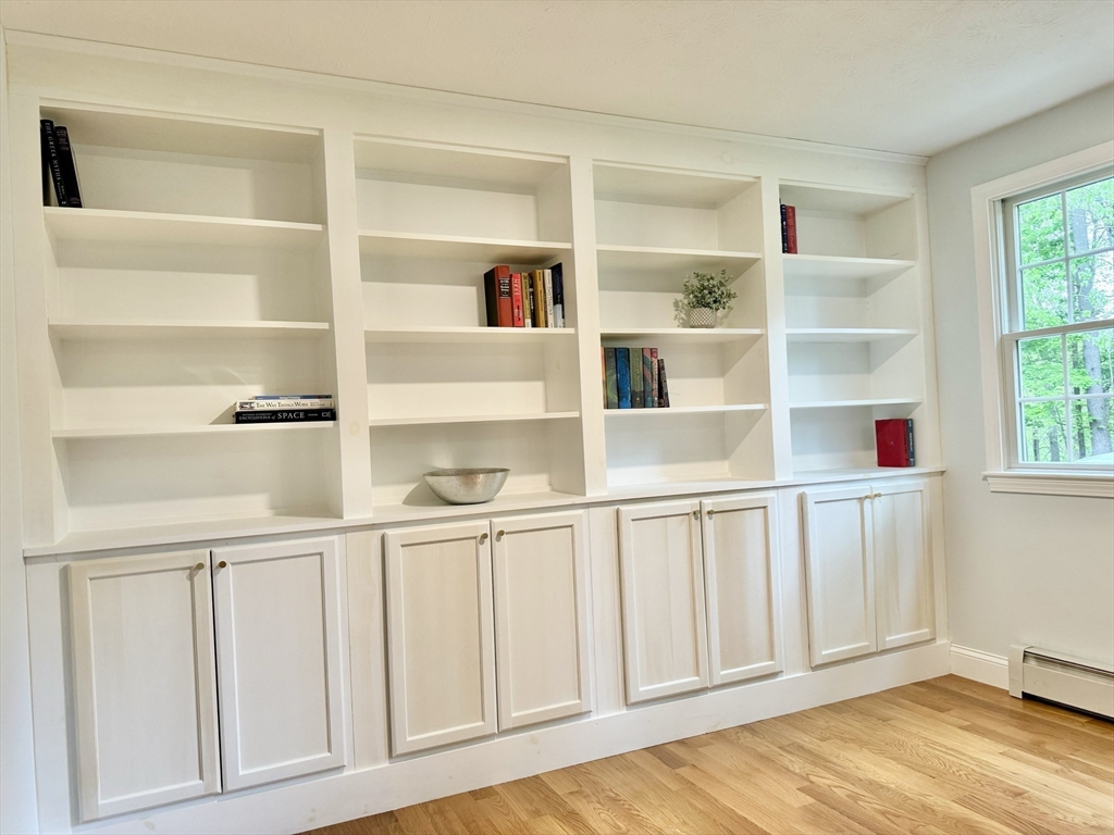 29 Whitewood Road Groton, MA 01450 - Photo 6 of 38 a room with white cabinets and window