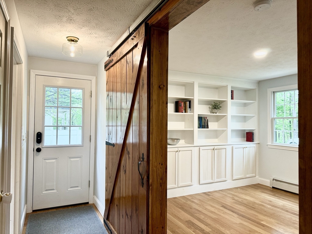 29 Whitewood Road Groton, MA 01450 - Photo 9 of 38 an empty room with windows