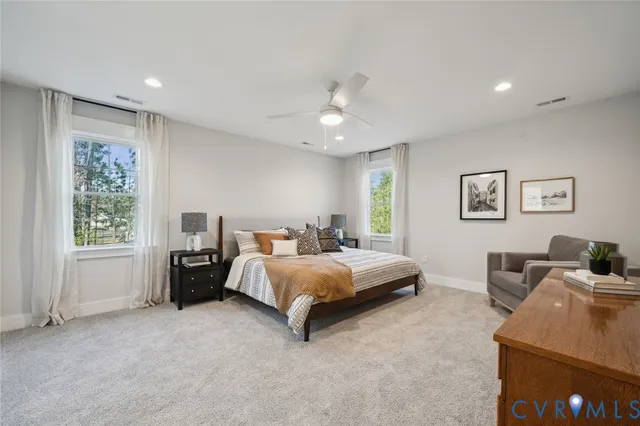 a bed room with furniture and a window