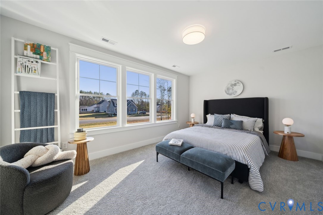 2471 Old Telegraph Road Providence Forge, VA 23140 - Photo 19 of 25 a bedroom with a bed and a couch