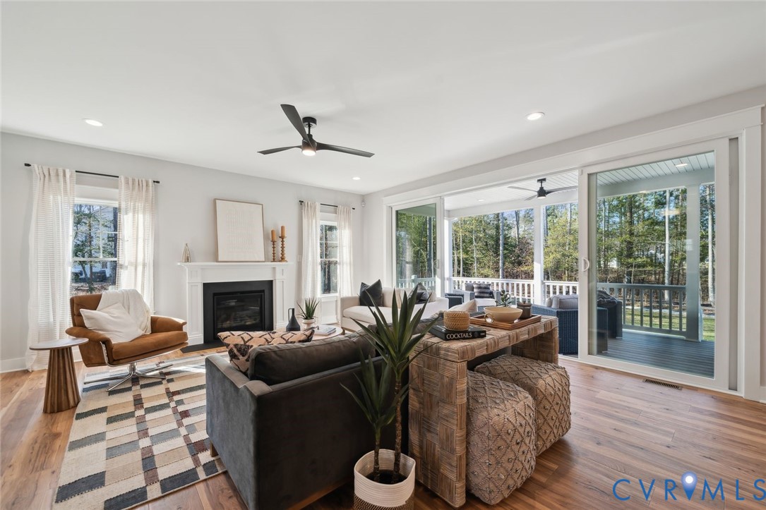 2471 Old Telegraph Road Providence Forge, VA 23140 - Photo 2 of 25 a living room with furniture and a fireplace
