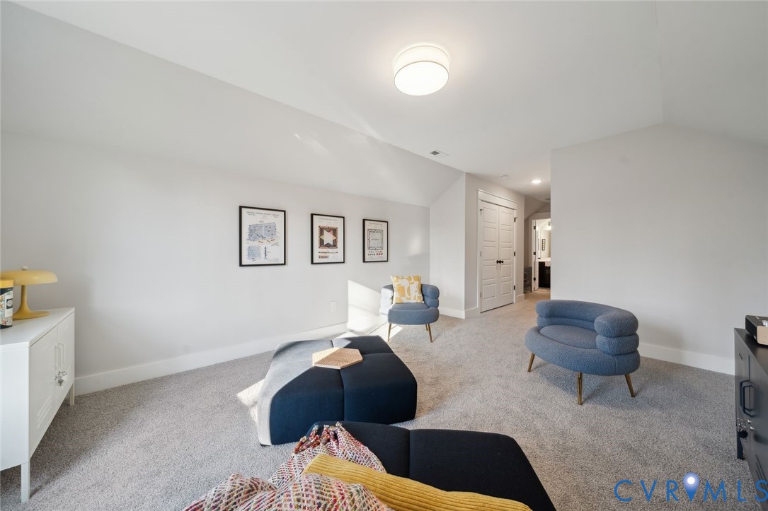2471 Old Telegraph Road Providence Forge, VA 23140 - Photo 21 of 25 a bedroom with a bed couch and a window