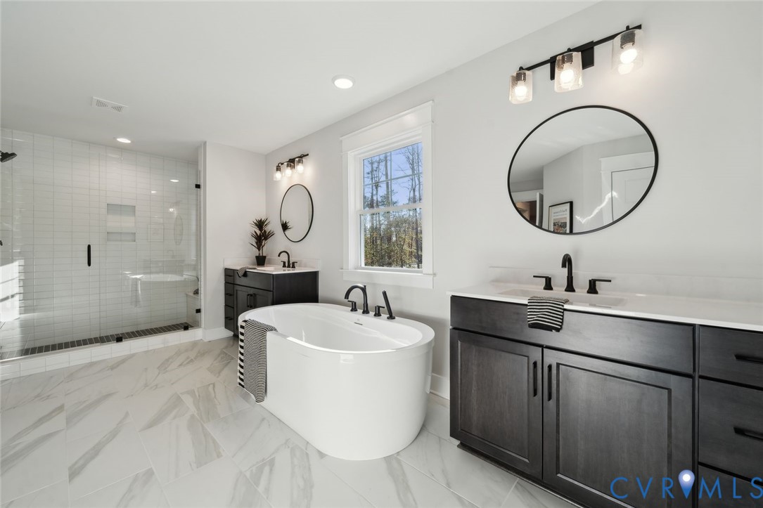 2471 Old Telegraph Road Providence Forge, VA 23140 - Photo 24 of 25 a bathroom with a sink and a mirror