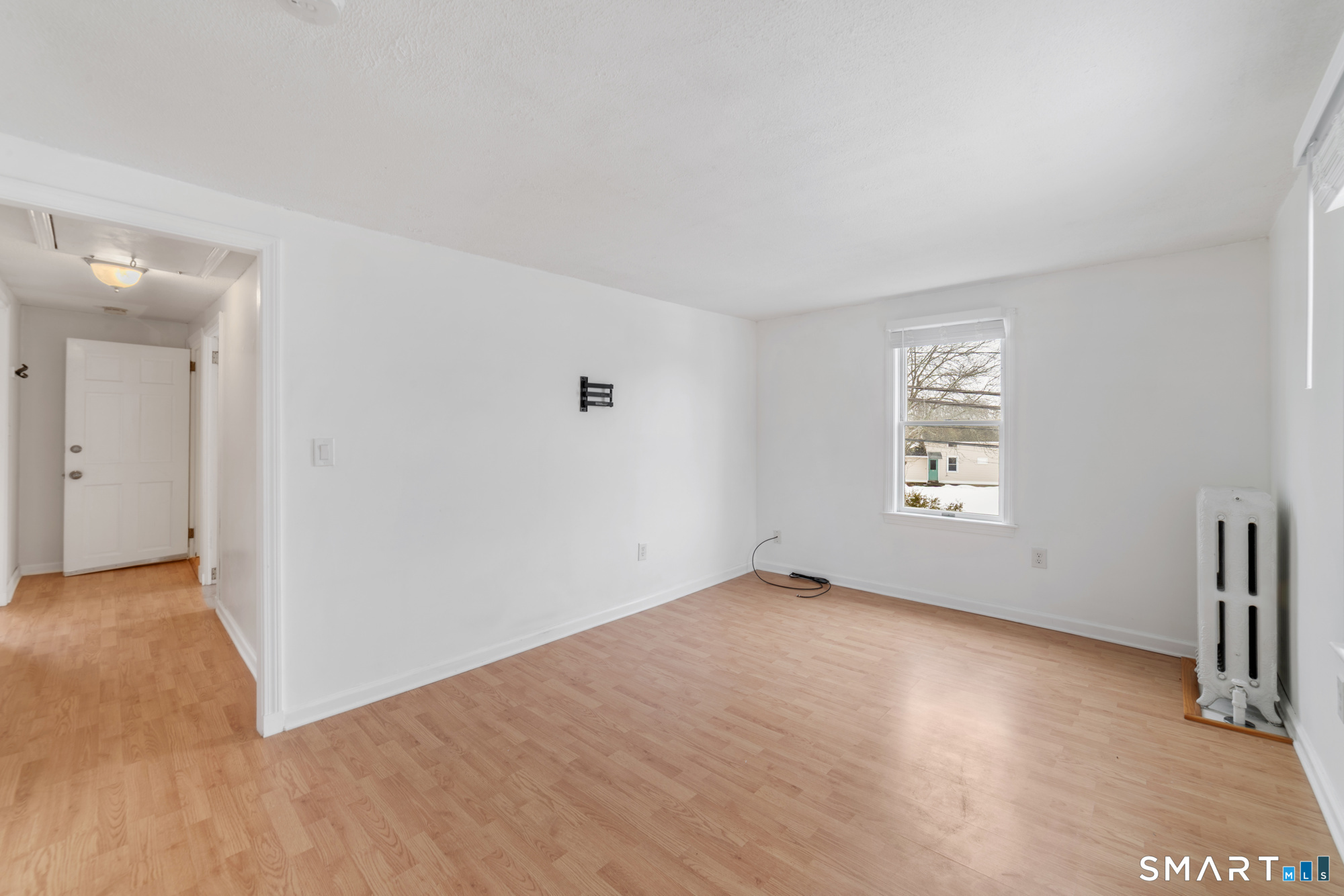 25 High Street Windsor, CT 06095 - Photo 4 of 40 an empty room with windows