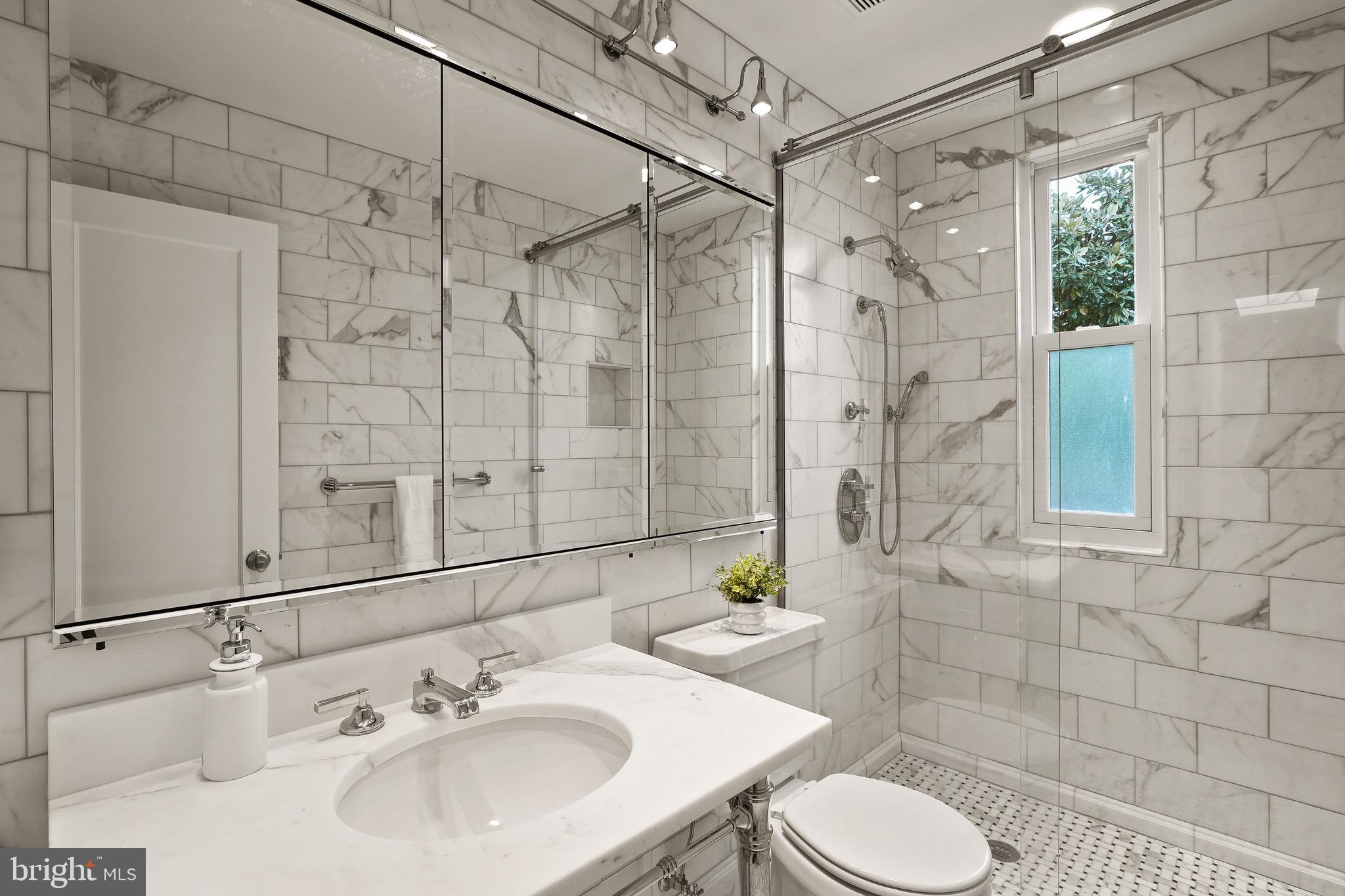 3010 R Street Northwest, Unit 3 Washington, DC 20007 - Photo 18 of 27 *Waterworks Marble Clad First Bathroom