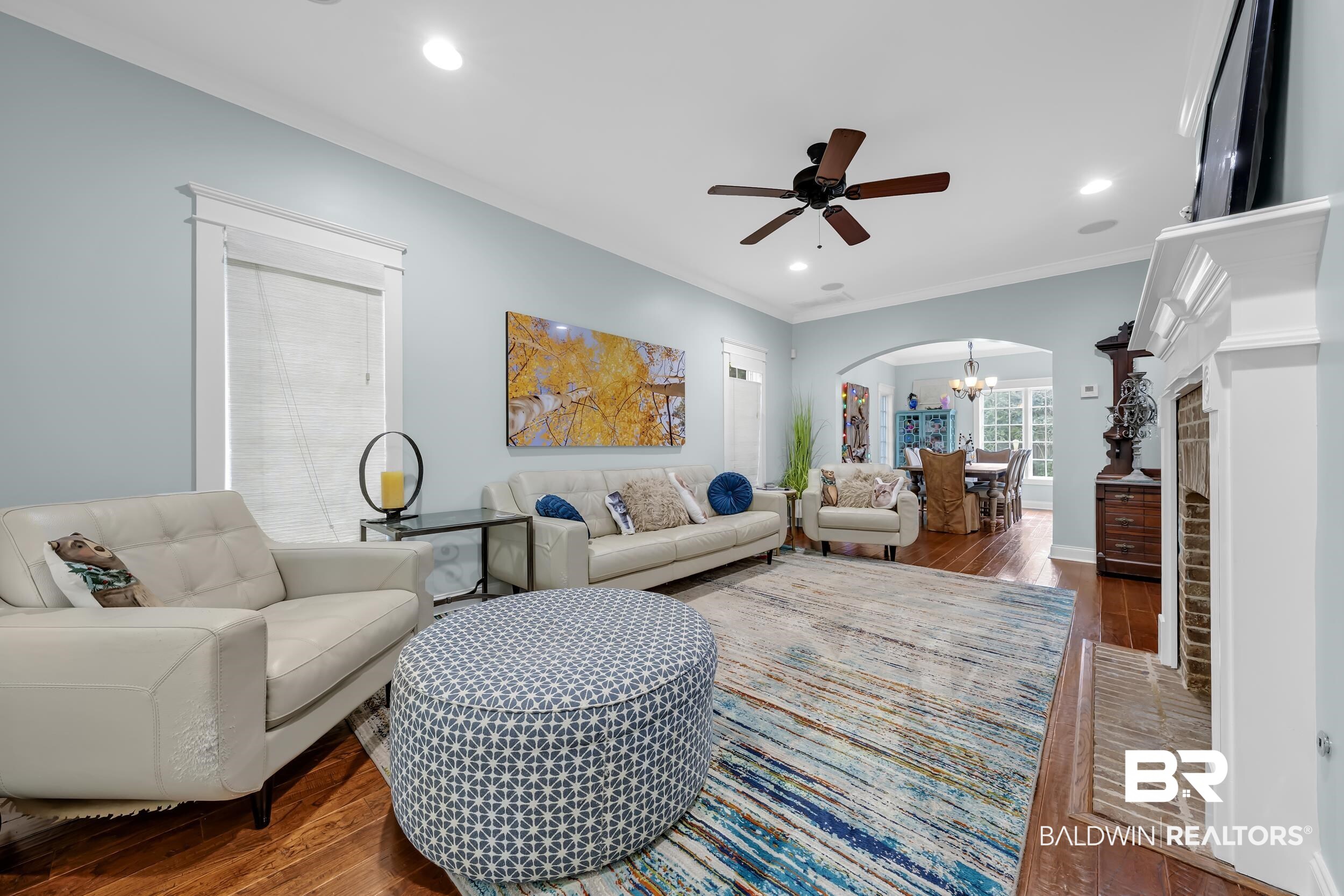 7 Bienville Avenue Mobile, AL 36606 - Photo 8 of 32 Living room with arched walkways, a chandelier, dark wood-type flooring, ceiling fan, and recessed lighting