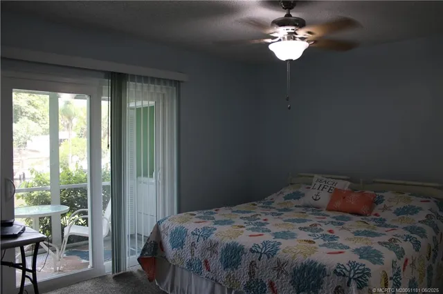 a bathroom with a sink a mirror and shower