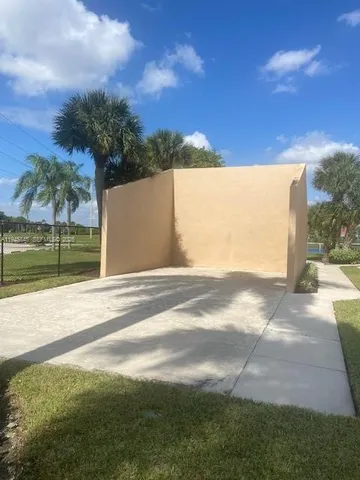 a view of an outdoor space and tennis court