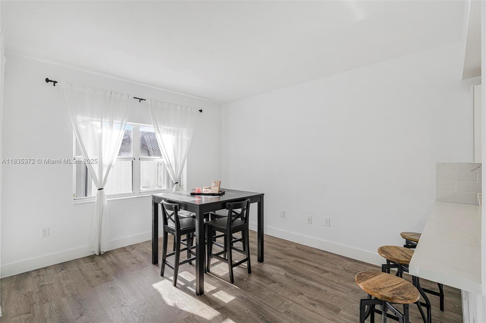 11532 Southwest 148th Path Miami, FL 33196 - Photo 13 of 36 a view of a room with furniture window and wooden floor