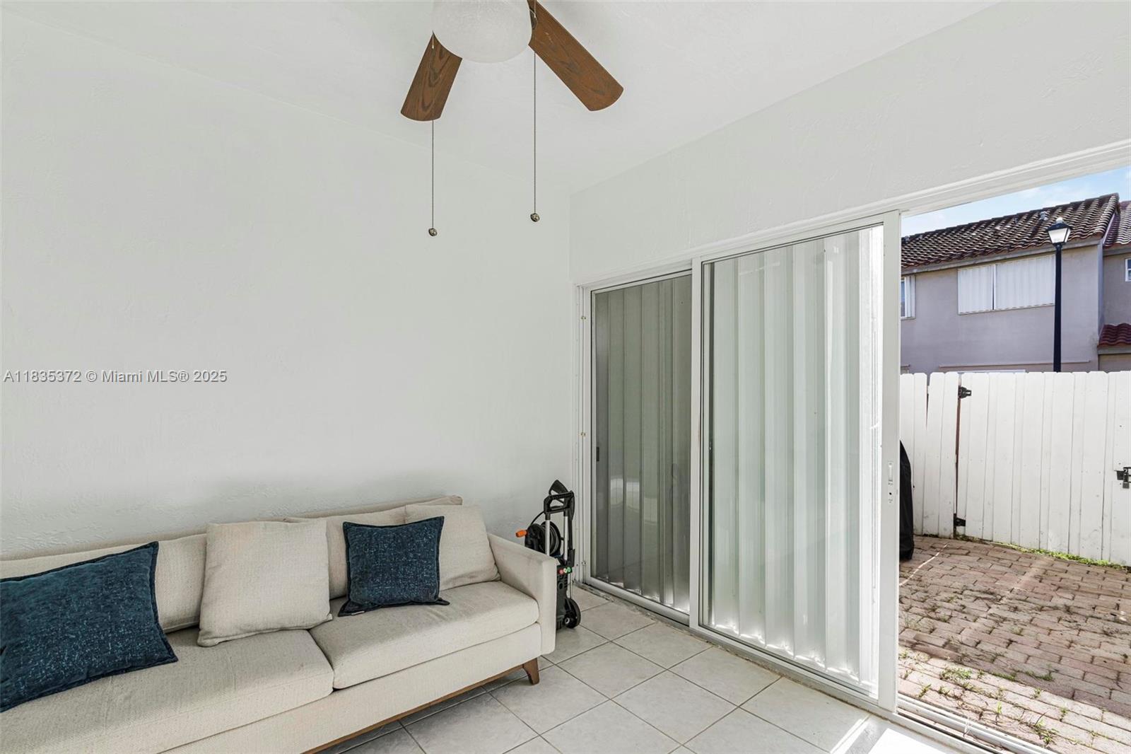 11532 Southwest 148th Path Miami, FL 33196 - Photo 24 of 36 a living room with furniture