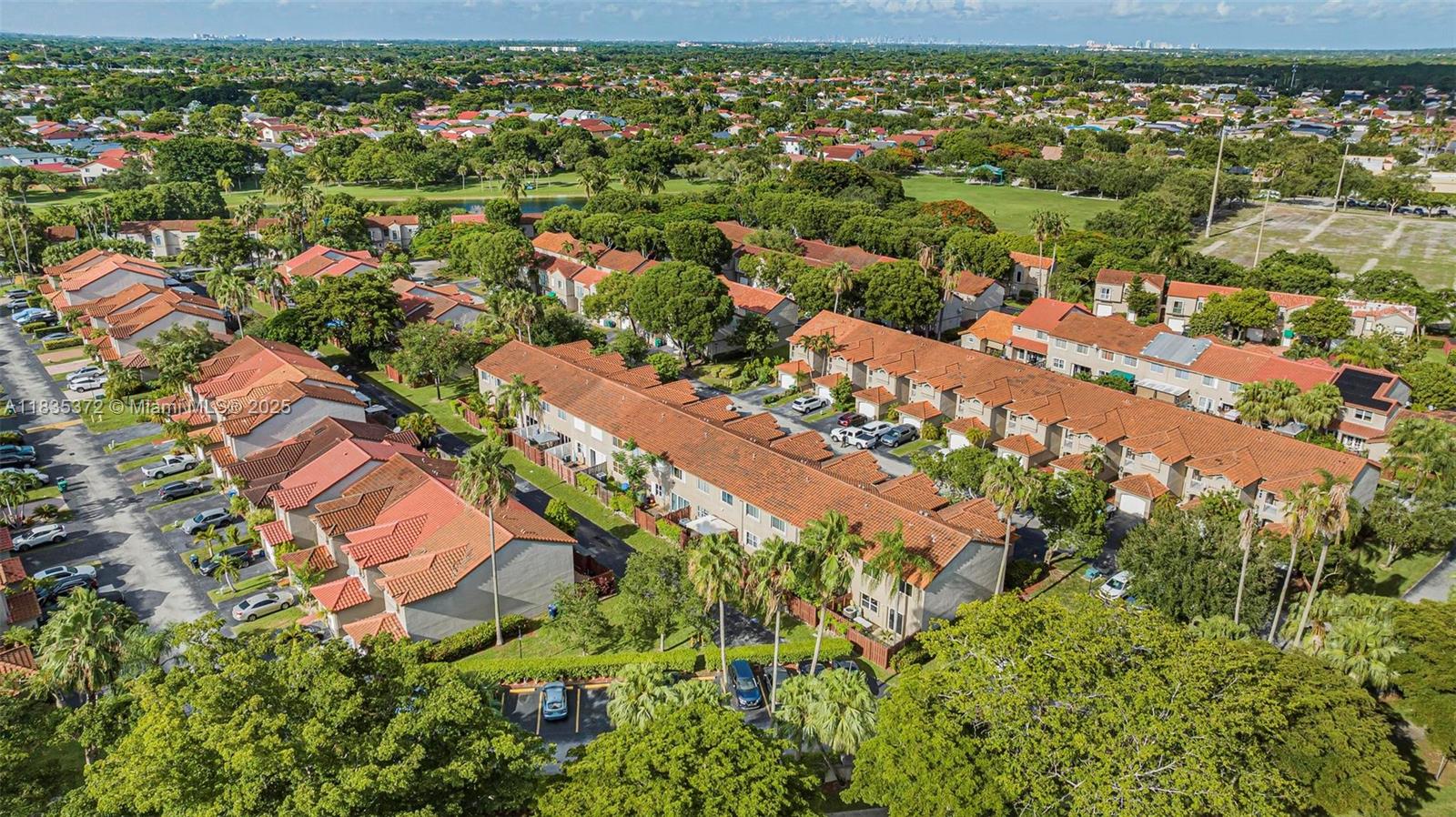 11532 Southwest 148th Path Miami, FL 33196 - Photo 30 of 36 an aerial view of residential houses with outdoor space and trees