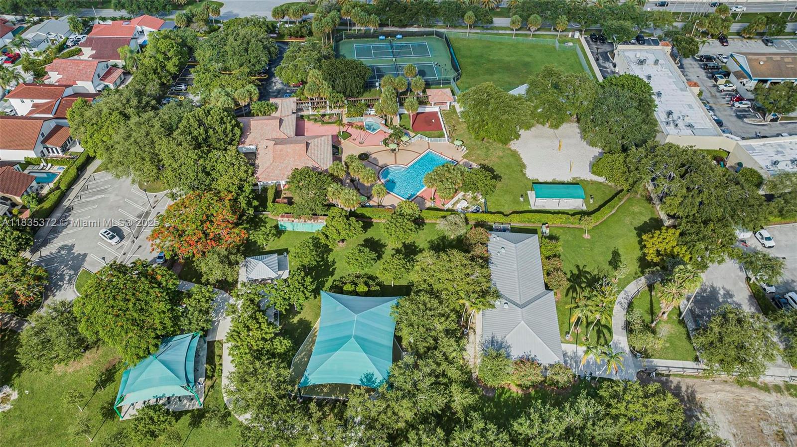 11532 Southwest 148th Path Miami, FL 33196 - Photo 32 of 36 an aerial view of a house with a yard