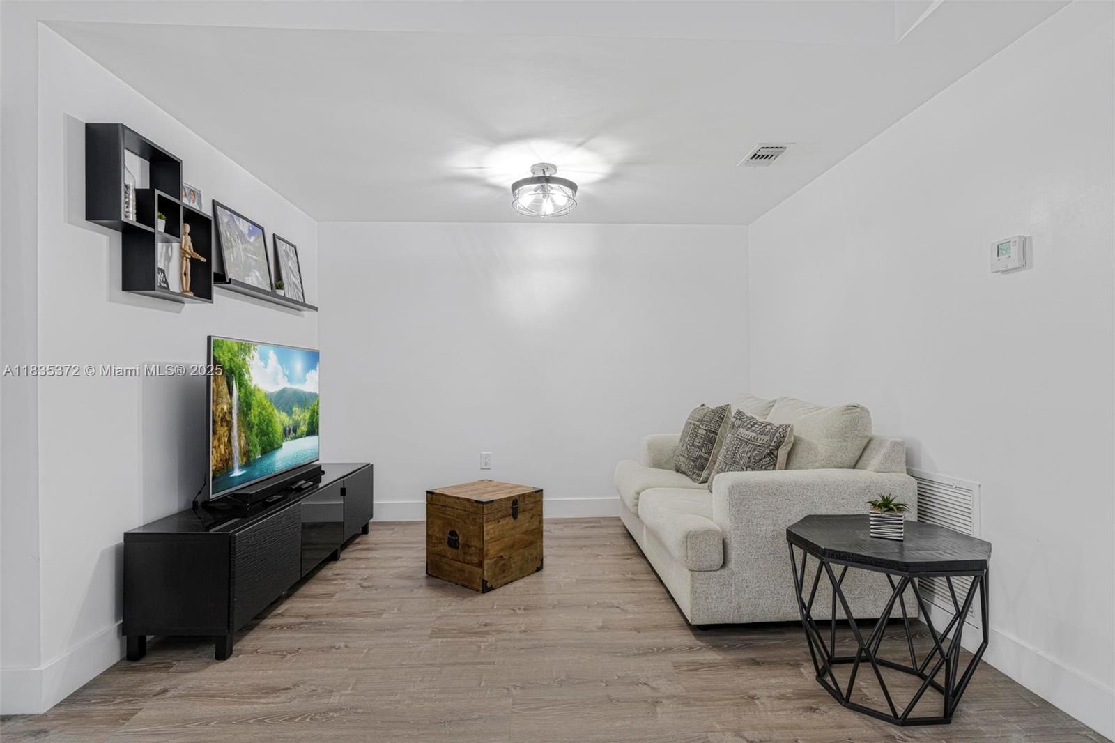 11532 Southwest 148th Path Miami, FL 33196 - Photo 9 of 36 a living room with furniture