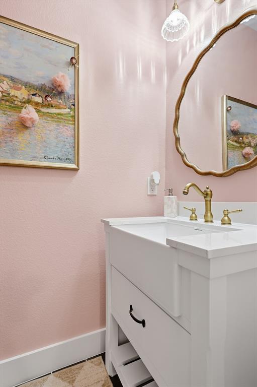 3618 Applewood Road Melissa, TX 75454 - Photo 14 of 39 a bathroom with a sink and a mirror