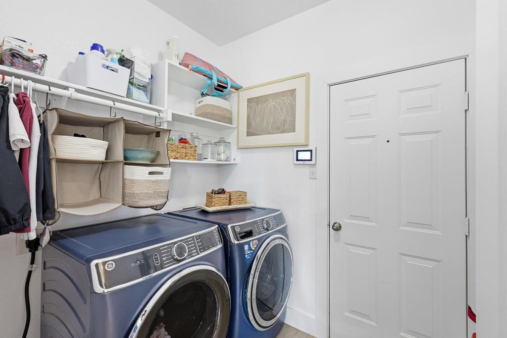 3618 Applewood Road Melissa, TX 75454 - Photo 15 of 39 a view of storage and utility room with washer and dryer