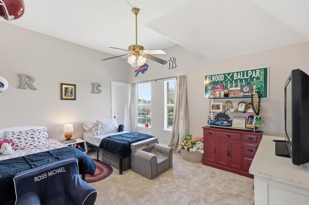 3618 Applewood Road Melissa, TX 75454 - Photo 25 of 39 a living room with furniture and wooden floor