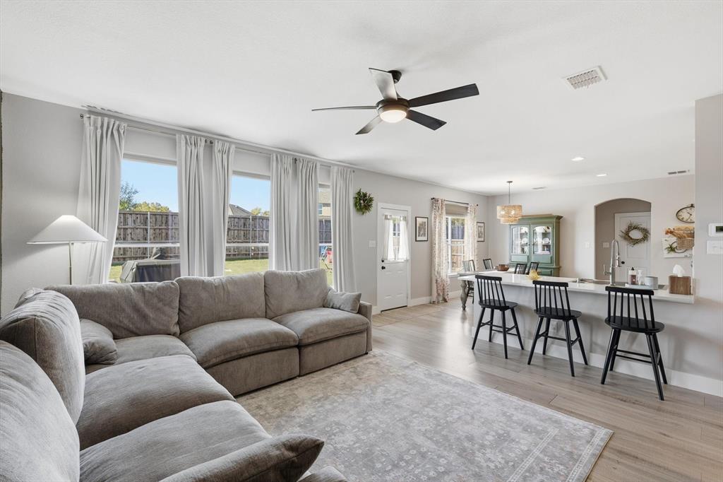 3618 Applewood Road Melissa, TX 75454 - Photo 8 of 39 a living room with furniture wooden floor and a window