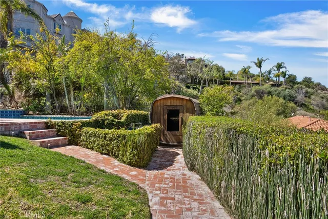 a view of a garden with a pathway